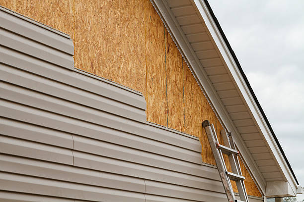 Professional Siding Replacement technician working in Lake Lynn, PA